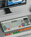 75 Percent Mechanical Keyboard With Tri Mode Wireless Connection And Interactive TFT Display Featuring A Programmable Knob For Custom GIFs, shown on a desk.