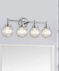 Four Light Chrome Bath Vanity Fixture With Globe Glass Uplight And Downlight 30 Inch Wide above mirror