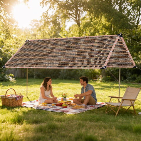 90 Percent Shade Cloth With Grommets For Pergola Cover over picnic setup in backyard, protects from sun, lets rain through.