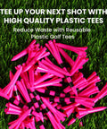Pile of unbreakable plastic golf tees set pro grade with long and short options two and three quarters inch on grass