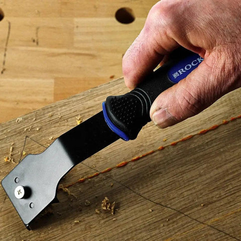 Durable Glue And Wood Scraper With Ergonomic Rubberized Handle And Reversible Blade For Furniture Refinishing Pro Grade Compact Lightweight Tool In Use On Wood Surface