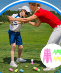 Instructor assisting child with golf swing next to multicolor plastic golf tees for 30 Piece Golf Tees Set For Home Indoor Outdoor Practice