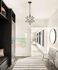 14 Inch Star Pendant Light With Seeded Glass Shade in a hallway with bench and striped rug, adjustable hanging chain, modern decor