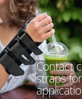 Person wearing Formfit Thumb Spica Brace For DeQuervain's Tendonitis, Arthritis, And Gamekeeper's Thumb while holding drink