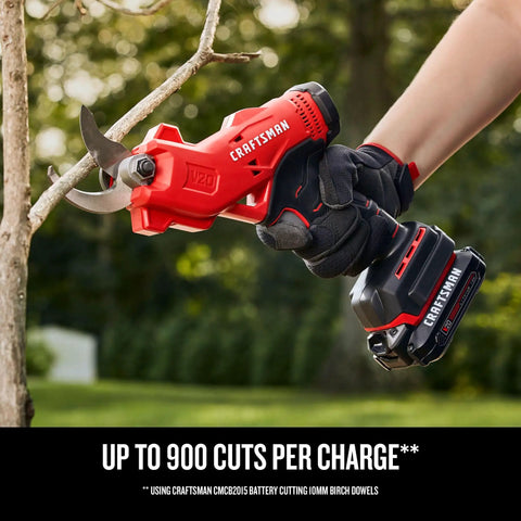 Cordless Electric Pruner With 2 Ah Battery And Charger Included cutting a tree branch in a garden setting