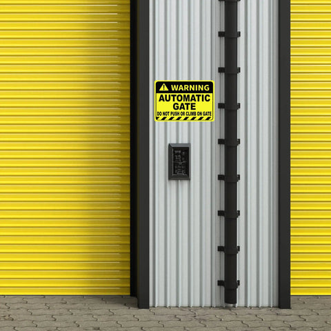 Heavy Duty No Sweat Automatic Gate Warning Sign 8X12 Inches Rust Proof Aluminum mounted on a corrugated metal gate.