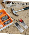 Heavy Duty Silent Sliding Door Wheels For Barn Gates Smooth As Butter Roller Guides with tools and screws on a work surface.