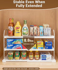 Heavy Duty Expandable Three Tier Kitchen Cabinet Organizer And Pantry Shelf Rack for food storage, fully extended with various items.