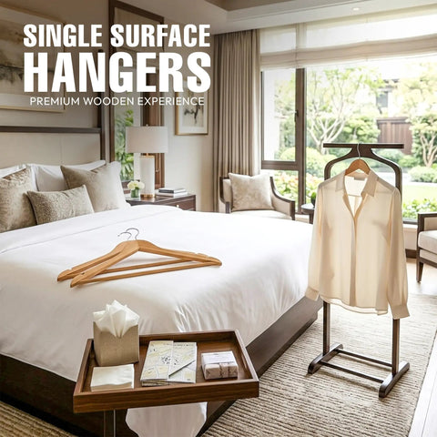 Bedroom with Premium Wooden Coat Hangers Set Of 30 With Slim Profile Built To Last 360 Degree Rotating Hook on bed and rack