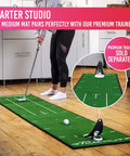 Person practicing on Medium Putting Mat For Home Golf Practice, 7.9ft x 1.6ft Green, Smooth Roll And Medium-Fast Pace in kitchen setup