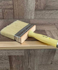 Heavy Duty 5 Inch Paint Brush With Screwed Extended Handle For Decks And Fences Stain Block Poly Bristle Blend on wood surface.