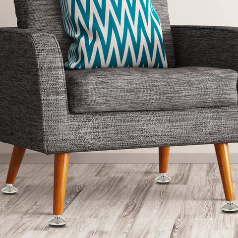 10 Pack Heavy Duty Stainless Steel Adjustable Furniture Leveling Legs With Swivel Base on a gray sofa, providing stability and support.