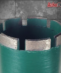 Close-up of 5 Inch Aggressive Diamond Turbo Core Drill Bits With V Tip For Core Drill Stand Rigs In Concrete Masonry And Cinder Blocks Dry Or Wet Use Laser Welded Segments Thin Wall Steel Core Medium Bond For General Purpose Drilling Across Materials
