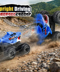Beast Amphibious Remote Control Shark Monster Truck for Water Play driving off-road on rocky terrain showcasing upright driving