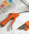 Heavy Duty 2 Pack Air Blow Gun Set With Ergonomic Pistol Grip And Solid Iron Barrel Reliable Compressor Nozzle For Daily Grind Cleanups Dust Blasting And Mechanic Detailing In Bright Orange on a work surface.