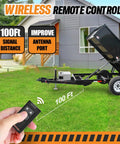 High Power Wireless Dump Trailer Remote Controller For 12V Hydraulic Systems, No Wires, hand holding remote with trailer in background.