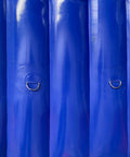 Close-up of heavy duty inflatable sound blocker for construction yards with secure metal rings for anchoring.