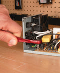 Using Quarter Inch Drive Anodized Stainless Steel Ratchet With 72 Tooth Gear to adjust screws inside electronic device.