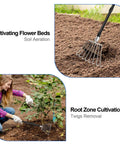 Leaf Rake With Eight Round Tine Design For Quick Lawn Cleanup Metal Garden Rake in use on flower bed and garden soil