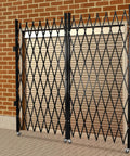 Heavy Duty Double Folding Security Gate Built Like A Tank For Garage And Warehouse With Rock Solid Expandable Metal Scissor Design and Four Lockable Rolling Casters, black iron steel, 12 feet wide