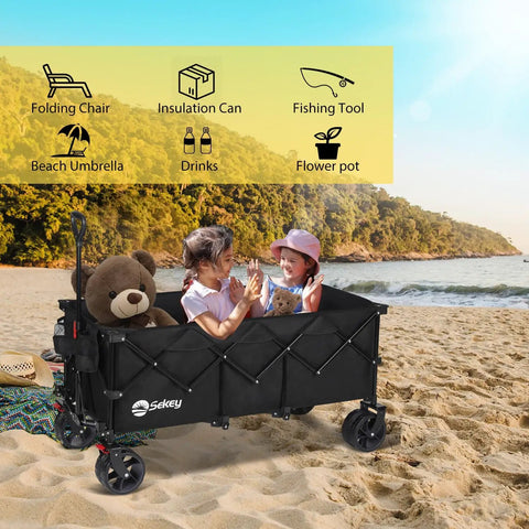 Heavy Duty Collapsible Wagon With 660 Lb Capacity on beach holding two kids and teddy bear