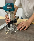User operating a router with a Six Inch Round Clear Acrylic Router Base Plate Straight Swap For RT0701C Or XTR01Z Models With Pre Drilled Holes.