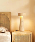 Travertine Stone Table Lamp With Warm White LED, Japanese Wabi Sabi Mushroom Nightstand Light on a bedside table
