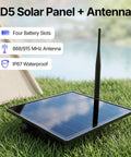 D5 Solar Panel + Antenna with four battery slots and IP67 waterproof design, installed on grass for outdoor use.
