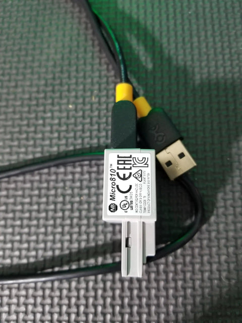 USB programming cable for Micro810 PLC, essential for training kit in automation and ladder logic learning.