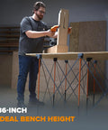 Man using Centipede CT9 36 Inch Tall Quick Setup Portable Folding Workbench With Carry Strap, collapsible construction table.