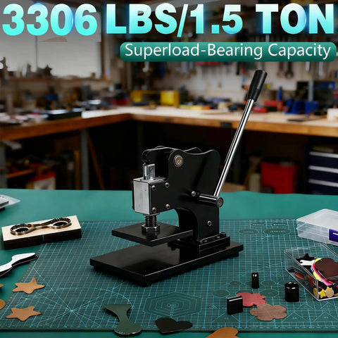 1.5 Ton Leather Die Cutting Machine With 12x9cm Leather Hand Press on a crafting table in a workshop setting.
