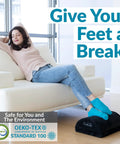 Woman relaxing on couch with feet on black under desk foot rest for pain relief and all day comfort, memory foam foot stool