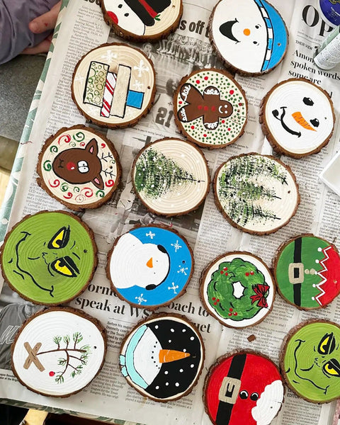 Wood Slices 30 Pcs Predrilled Round Discs 3.5-4 Inches Unfinished Rustic Craft Kit decorated as Christmas ornaments.