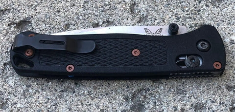 Kick Ass Copper Powder Coated Torx Screw Set Spice Up Your Blade With Slick Stainless Steel Fasteners on a black EDC knife.