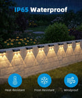 Solid Solar Fence Lights Outdoor Deck Waterproof Warm White Glow 8 Pack mounted on a stone wall, showcasing IP65 waterproof features.