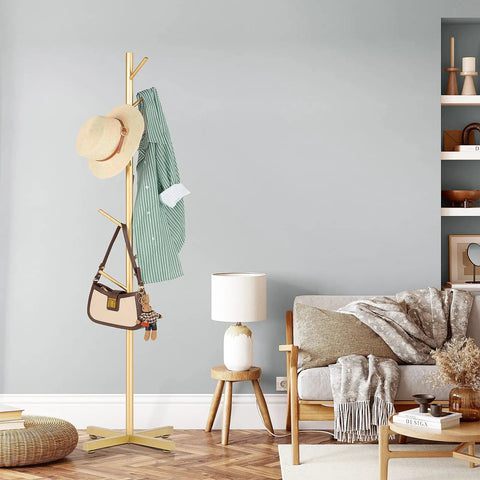 Freestanding Metal Coat Rack With Eight Hooks For Entryway Or Office, Easy To Assemble Modern Coat Tree In Golden Finish in living room