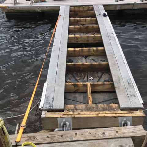 Beefy Heavy Duty Dock Hinge Kit For Floating Docks With Male And Female T Style Corner Hinges visible on a dock ramp connection