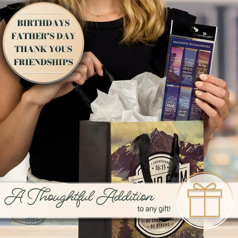 Person holding gift bag with Magnetic Christian Bookmark Set Of 6 Pagemarkers With Scripture Quotes And Uplifting Messages package.