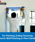 Person using Hand Masker Painter Tape And Masking Film Dispenser Kit For Fast Masking Prep With A 12 Inch Blade And Surface Safe Tape Film Set For Clean No Fuss Dope Paint Jobs on a window