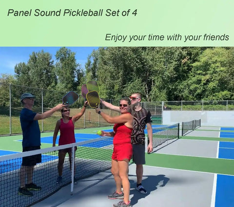 Group enjoying pickleball game with Four Pack Pickleball Paddles Set With Fiberglass Faces And 14mm Honeycomb Core on court.