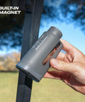 Captain Air Golf Rangefinder With Slope And GPS Distances being magnetically mounted on a cart.