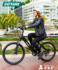 Dolphin 26 Inch Step Through Electric Bike For Adults, 350W Peak Motor With 20 MPH Top Speed, Removable 280Wh Battery, 15 To 30 Mile Range With Pedal Assist, Perfect For City Hops And Weekend Cruising on a black frame, ridden by a woman