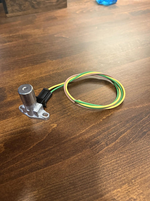 Heavy Duty Headlight Floor Dimmer Switch With Thick 14 Gauge Wiring Harness Pigtail And Straight Plug Connector For Gm Vehicles and Slick Plug and Play Rig on wood surface.