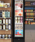 Slick Commercial Display Freezer With 6.5 Cubic Feet Capacity And 17 Inch Slim Profile showcasing ice creams and fruit bars behind glass.
