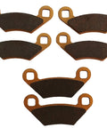 Six ceramic brake pads with copper backing plates, front view