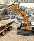 Toy construction set with two vehicles: orange XUEZHISHAN excavator on tracks with bucket and yellow dump truck.