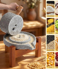 Hand-cranked Stone Grain Mill Grinder For Home Use With Solid Wood Base, grinding wheat, grains, and sesame into fresh flour.