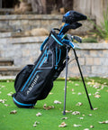 X-Lite Junior Golf Club Set For Kids Right Handed With Driver Hybrid 7 Iron Putter Stand Bag And Headcovers In Blue On Grass