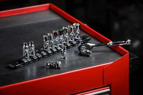 12 Piece One Quarter Inch Drive Metric Flex Socket Set With 6 Point Sockets From 5mm To 15mm on red tool chest, with ratchet