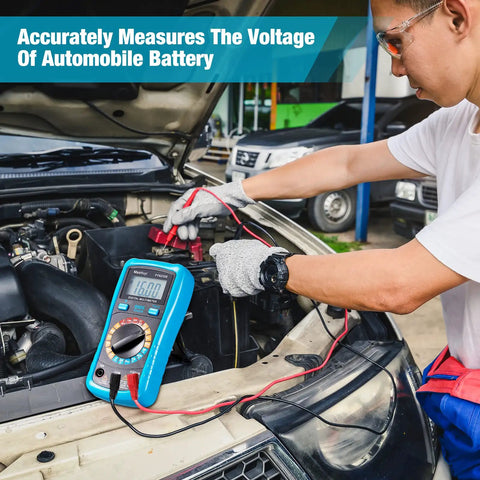 Person using multimeter to measure automobile battery voltage under car hood outdoors